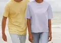 Γυναικείο oversized T-shirt από 100% οργανικό βαμβάκι, ιδανικό για επαγγελματική χρήση. Άνετη εφαρμογή χωρίς τσέπες, με δυνατότητα εκτύπωσης λογοτύπου.